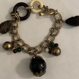 Elegant Gold and Black Charm Bracelet